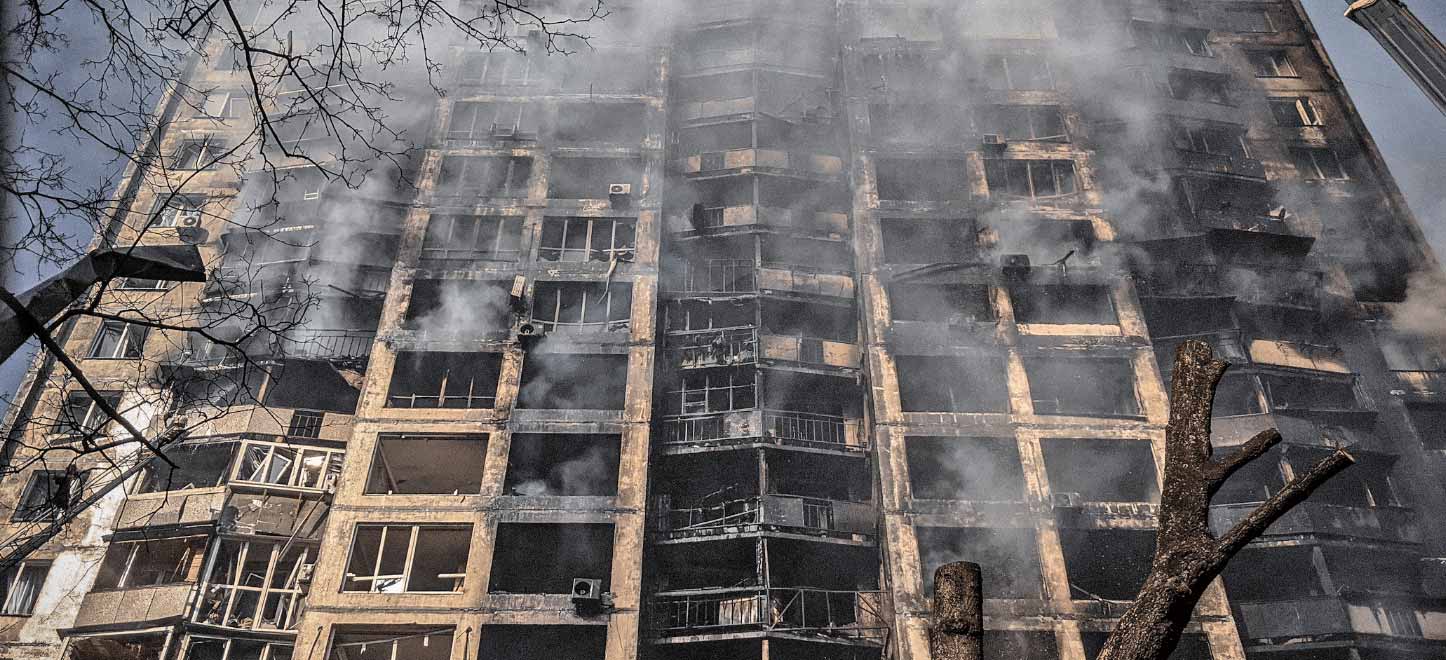 An image of a smouldering building in Kyiv.