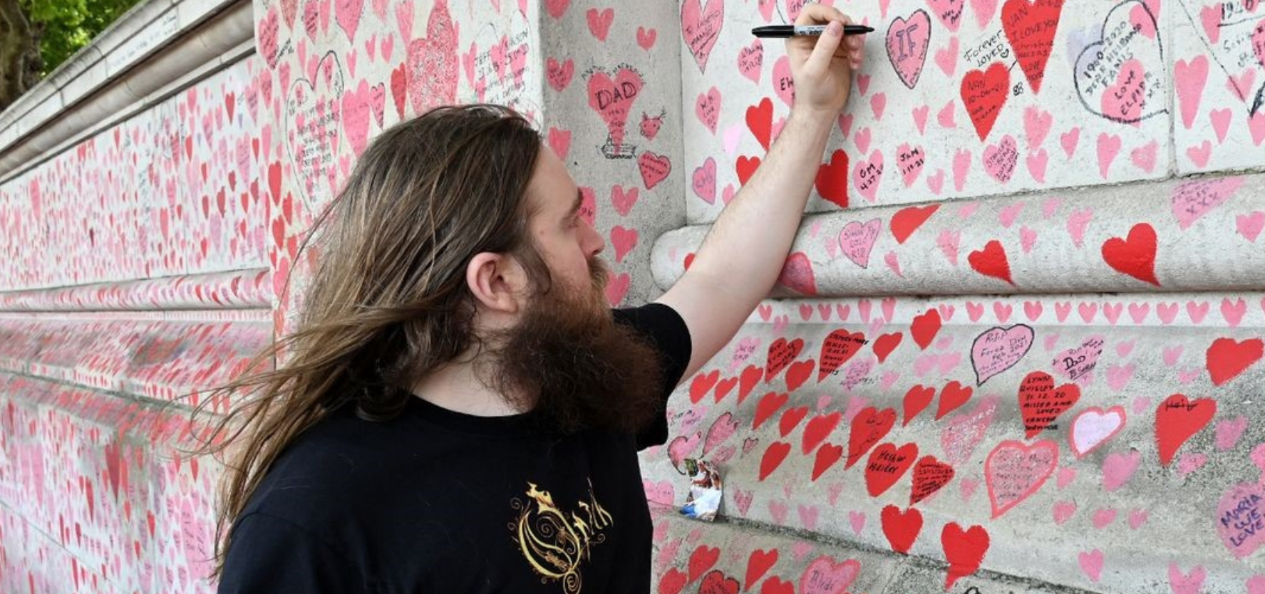 Matt Fowler, of Covid 19 Bereaved Families for Justice, is seen at the National Covid Memorial Wall. Picture: Covid 19 Beareaved Families for Justice