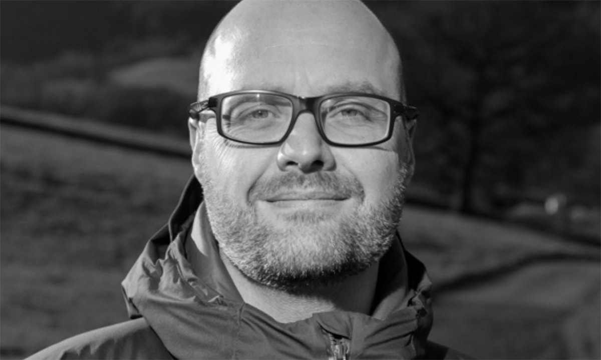 A black and white photo of Doug Weir, policy director at CEOBS